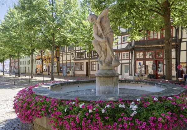 The glassblowing fountain on KreuzstraÃŸe in the historic old town centre of Rinteln. Lower Saxony, Germany