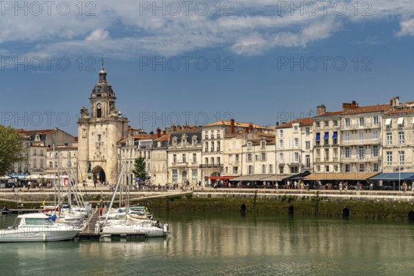 Harbour, Porte de la Grosse Horloge clock tower and the old town in La Rochelle, France