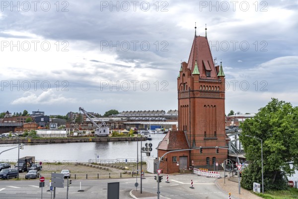 Bridge tower of the lift bridge and the Trave, Hanseatic City of LÃ¼beck, Schleswig-Holstein, Germany