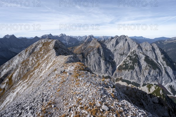 Mountain panorama, ridge of the Gamsjoch, transition to the main summit of the Gamsjoch, behind western summit with summit cross, behind mountain ridge of the Hinterautal-Vomper chain, in autumn, RiÃŸtal in the Eng, Karwendel, Tyrol, Austria