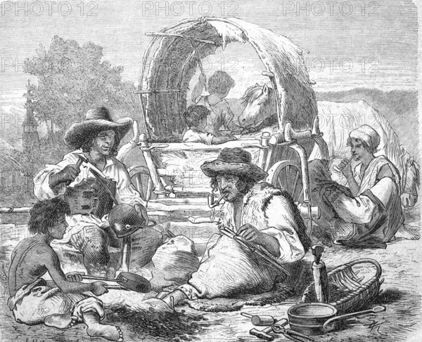 Travelling gypsies at work, here as metalworkers in front of their wagon, Hungary, Historical, Reproduction from a 19th century model with a scene from the 19th century
