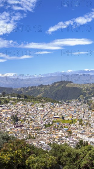 Skyline panoramic view of historic center in Quito, Ecuador from lookout of Virgin of Panecillo