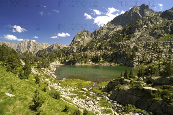 The glacial lake Estany de les Obagues de Ratera or Lagunas Llosas in the AigÃ¼estortes i Estany de Sant Maurici National Park, Catalonia, Spain