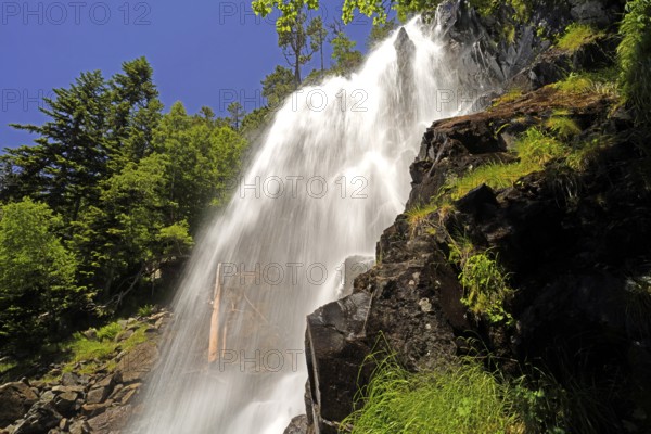 The Cascada de Ratera waterfall in the AigÃ¼estortes i Estany de Sant Maurici National Park, Catalonia, Spain