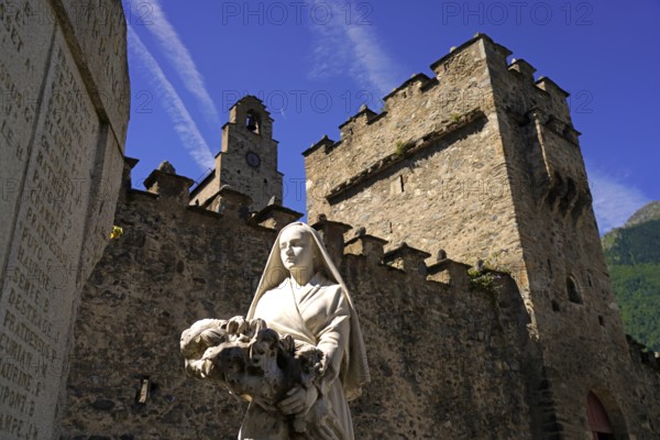 Monument in front of the Church of Saint-André or Church of the Templars in Luz-Saint-Sauveur, Pyrenees, France