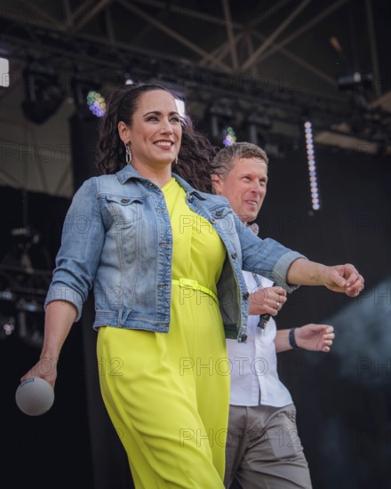 Simone Panteleit and Sebastian Oswald, presenters at the Berliner Rundfunk 91.4 Open Air at the Berlin ParkbÃ¼hne Wuhlheide on 5 July 2025