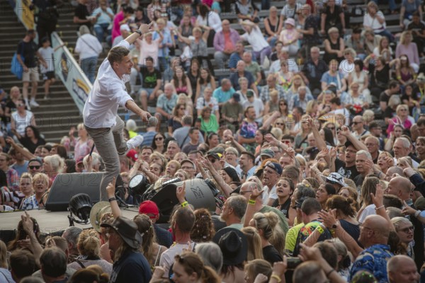 Sebastian Oswald, one of the presenters at the Berliner Rundfunk 91.4 Open Air at the Berlin ParkbÃ¼hne Wuhlheide on 5 July 2025