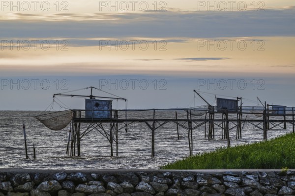 Sunset over Fishing huts over Randonnee entre Histoire et Nature, Fouras, Fouras-les-Bains, Charente-Maritime, Nouvelle-Aquitaine, France