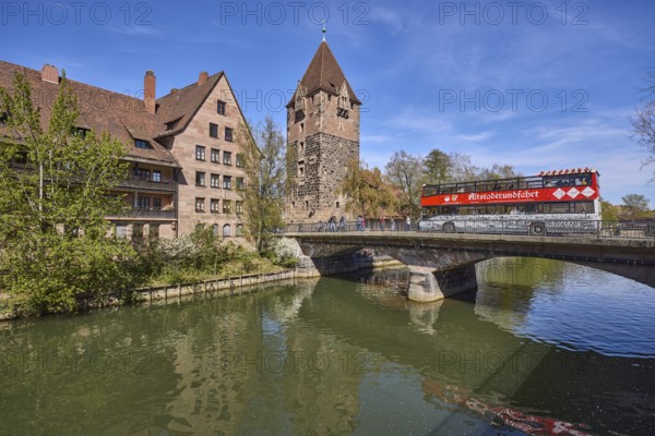 Tourism, city tours, bus, Schuldturm, river Pegnitz, bridge, historical buildings, house, trees, reflections, water surface, blue sky, cirrostratus clouds, HeubrÃ¼cke, Vordere Insel SchÃ¼tt, Nuremberg, Middle Franconia, independent city, Bavaria, Germany