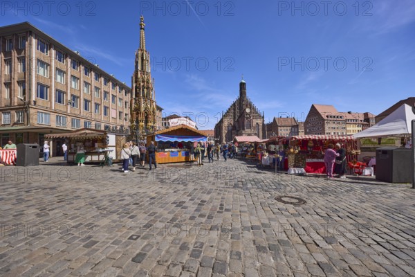 Beautiful fountain, Church of Our Lady, town hall, architectural style 1950s, church, market, market stalls, square, cobblestone pavement, pedestrians as secondary motif, blue sky, cirrostratus clouds, main market, Nuremberg, Middle Franconia, independent city, Bavaria, Germany