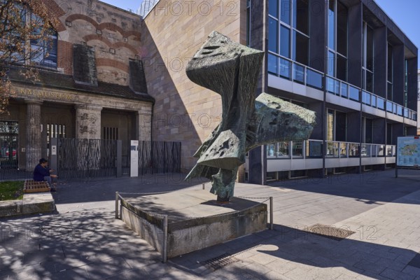 Great Phoenix I, sculptor Bernhard Heiliger, stone sculpture, Germanisches National Museum, museum of cultural history, facade, building, sunny, square Kornmarkt, Nuremberg, Middle Franconia, independent city, Bavaria, Germany