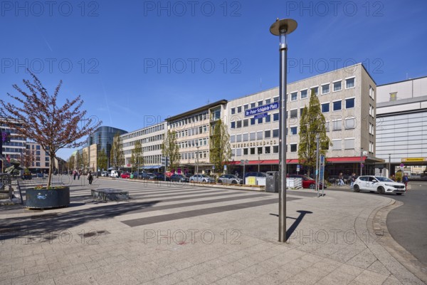 Square, lantern, modern architecture, trees, parking lane with vehicles, alleyway sign, blue sky, cloudless, Dr.-Peter-Schönlein-Platz, Kornmarkt, Frauengasse, Nuremberg, Middle Franconia, independent city, Bavaria, Germany