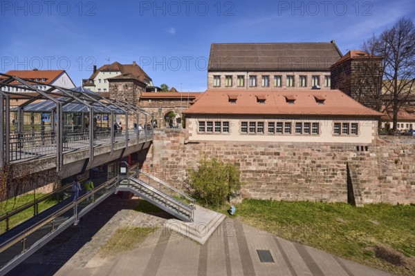 Tavern Tucher-BrÃ¤u at the opera house, old town, pedestrian bridge, city fortification, city wall, historical building, trees, lawn, blue sky, cirrostratus clouds, Frauentor wall, Nuremberg, Middle Franconia, independent city, Bavaria, Germany