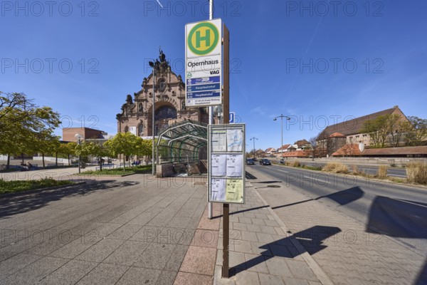 Nuremberg State Theatre, theatre, opera, architect Christian Heinrich Seeling, lantern, trees, general architecture, pavement, blue sky, street Frauentorgraben, Nuremberg, Middle Franconia, independent city, Bavaria, Germany