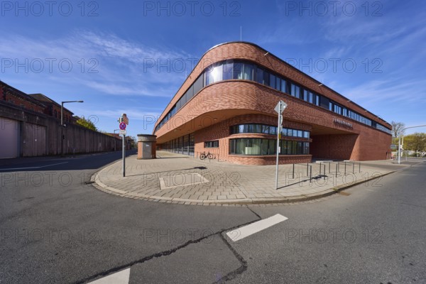 Fire Station 1, modern architecture, street, footpath, pavement slabs, asphalt, blue sky, cirrostratus clouds, intersection ReutersbrunnenstraÃŸe with MannertstraÃŸe, Nuremberg, Middle Franconia, independent city, Bavaria, Germany