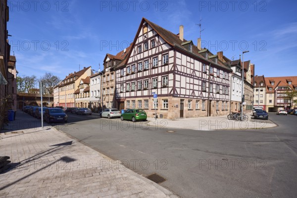 Old town, half-timbered house, general architecture, lantern, parking lane with vehicles, blue sky, cirrostratus clouds, streets, intersection Schlotfegergasse with Mostgasse, Nuremberg, Middle Franconia, independent city, Bavaria, Germany
