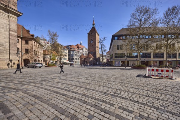 White Tower, square, cobblestones, fenced-off construction site, general architecture, pedestrians as secondary motif, blue sky, cloudless, Jakobplatz, Dr.-Kurt-Schumacher-StraÃŸe, Ludwigsplatz, Nuremberg, Middle Franconia, independent city, Bavaria, Germany