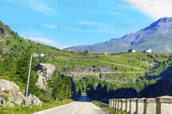 South ramp access road with hairpin bends on a steep slope to the Mont Cenis Pass Col du Mont Cenis in the French High Alps, Département Savoie, Region Auvergne-RhÃ´ne-Alpes, France