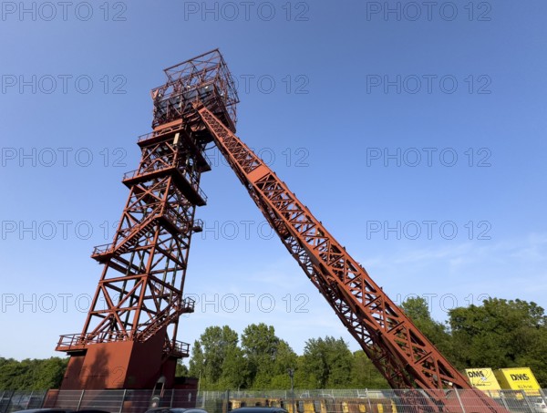 Historic red headframe historic red winding tower of Bonifacius colliery coal mine in mining region Ruhr area in today's district Kray Nord, Essen, North Rhine-Westphalia, Germany