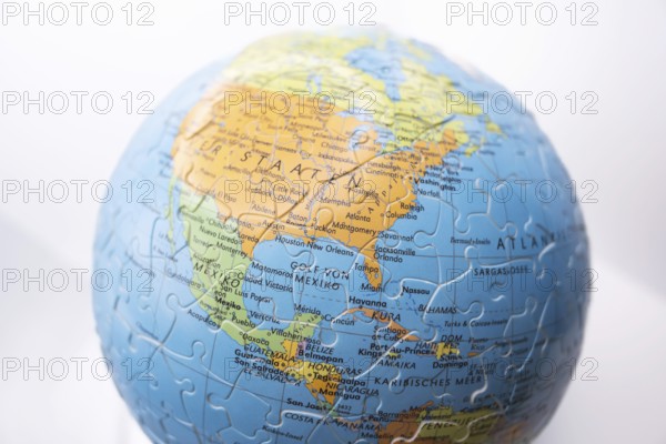 Puzzle globe. Map made from puzzle pieces. Gulf of Mexico