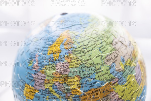 Puzzle globe. Map made from puzzle pieces