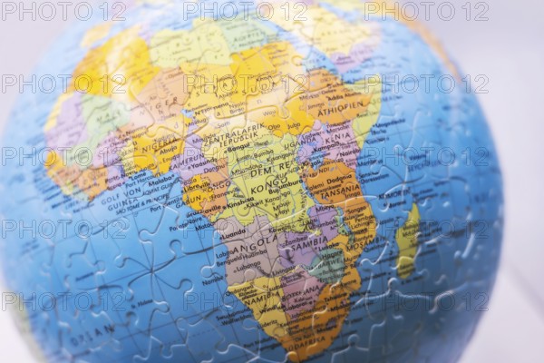 Puzzle globe. Map made from puzzle pieces. Africa