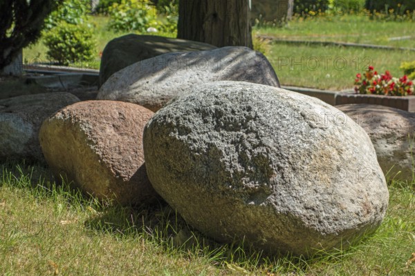 Massive erratic blocks, boulders, granite stones, Lutheran cemetery, Heisfelder StraÃŸe, Leer, East Frisia, Germany