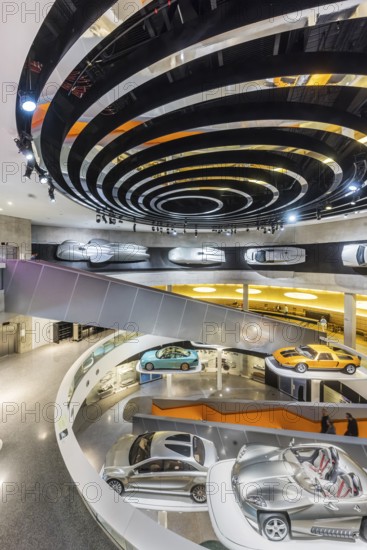 The Mercedes-Benz Museum in Stuttgart presents a journey through the automotive history of the global corporation. The history of the Mercedes star begins with the first automobile in 1886. 160 vehicles are on display. Stuttgart, Baden-WÃ¼rttemberg, Germany