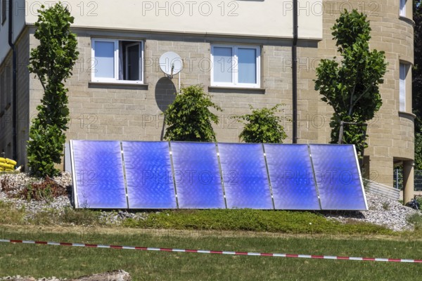 Solar collector in the garden of a detached house. Nagold, Baden-WÃ¼rttemberg, Germany