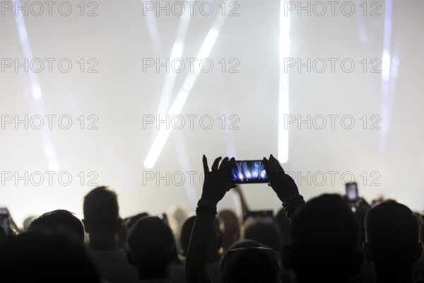 A visitor films the concert of Kylie Minogue live on Tension Tour 2025 in the Berlin Uber Arena on 04.07.2025 Note: according to the contract with the management, the photos may only be used up to 3 months after the concert