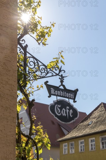 Advertising sign for pastry shop and café in Bad Windsheim, Bavaria, Germany