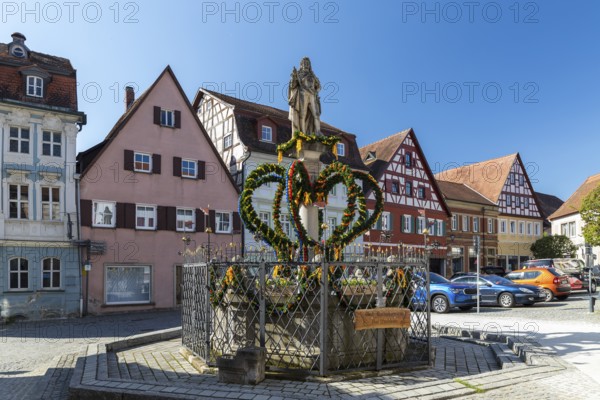 Fountains and half-timbered houses on the wine market, Bad Windsheim, Bavaria, Germany