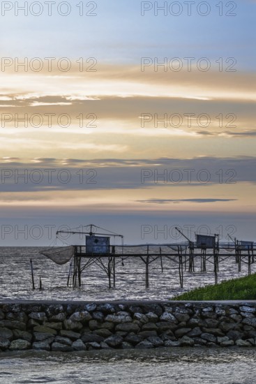 Sunset over Fishing huts over Randonnee entre Histoire et Nature, Fouras, Fouras-les-Bains, Charente-Maritime, Nouvelle-Aquitaine, France