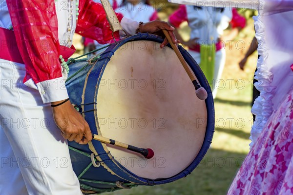 Drums and colorful clothes at the typical religious festival of Congado in a quilombo in Minas Gerais, Minas Gerais, Brazil