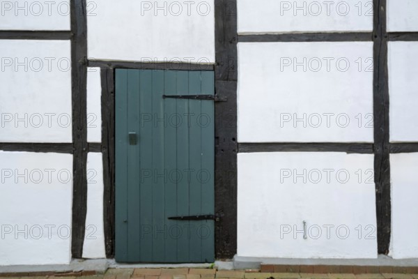 Stable door of a half-timbered barn, Legden-Asbeck, MÃ¼nsterland, North Rhine-Westphalia, Germany