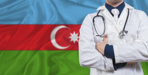 Male doctor with stethoscope on Azerbaijan flag. Doctor holding stethoscope on Azerbaijan flag