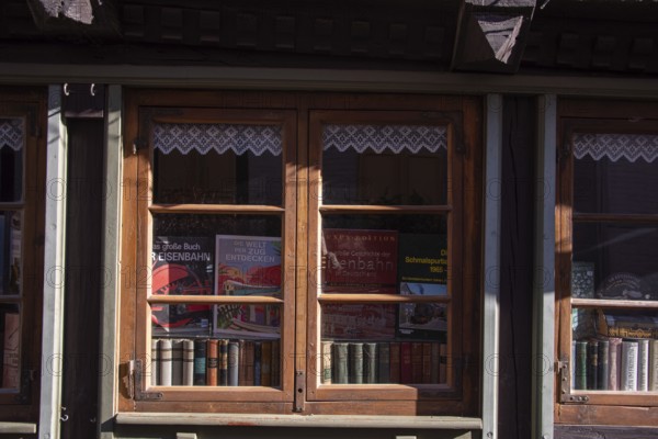 Decorated shop window with historical railway books and nostalgic flair, antiquarian bookshop, Quedlinburg, Saxony-Anhalt, Germany
