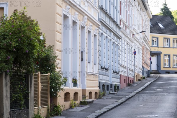 A street with apartment blocks from the Wilhelminian era in Wuppertal, Germany