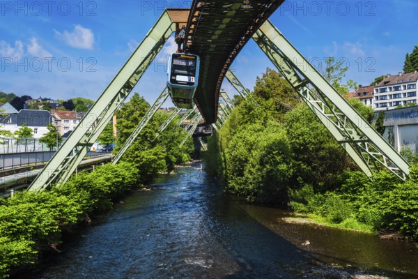 A suspension railway over the Wupper near the AdlerbrÃ¼cke stop, Wuppertal, Germany