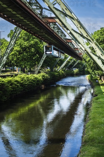 A suspension railway over the Wupper near the AdlerbrÃ¼cke stop, Wuppertal, Germany