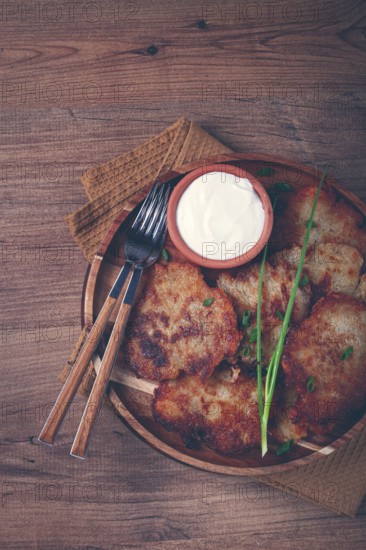 Potato pancakes, pancakes with sour cream, Belarusian dish, homemade, no people