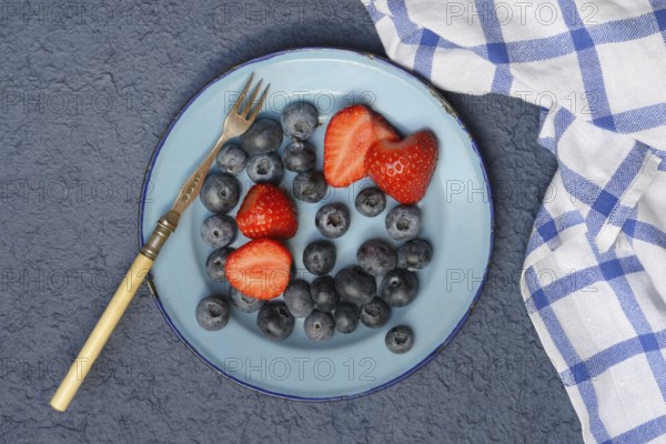 Plate with strawberries and blueberries, Fragaria, Vaccinium