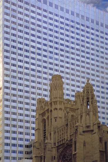 Historic St Thomas Episcopa Church, built in 1824, in front of a skyscraper, 53rd Street, Manhattan, New York City, USA