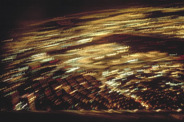 View of New York City at night from an aeroplane, blurred, USA