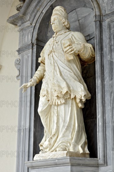 Marble statue of Pope Clement XI by sculptor F. Marattis from Padua in the portico of the Benedictine Abbey of Montecassino, Monte Cassino, Cassino, Frosinone, Lazio, Italy