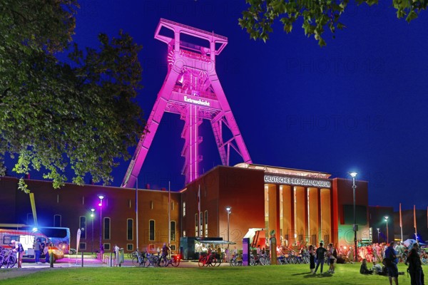People in front of the German Mining Museum for the Extra Shift at night, Bochum, Ruhr Area, North Rhine-Westphalia, Germany
