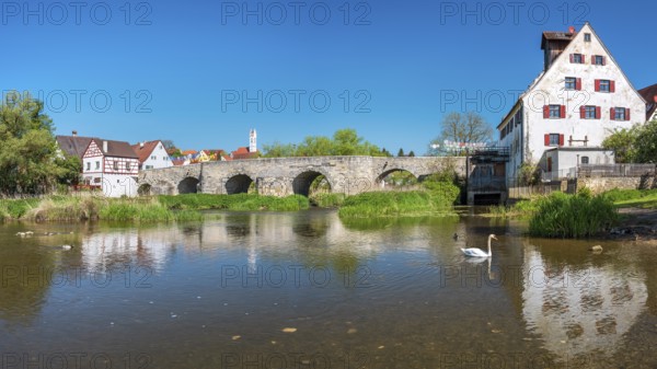 View over the river Wörnitz to the old town with the medieval stone bridge and the Herz Jesu church, Harburg, Donau-Ries, Swabia, Bavaria, Germany