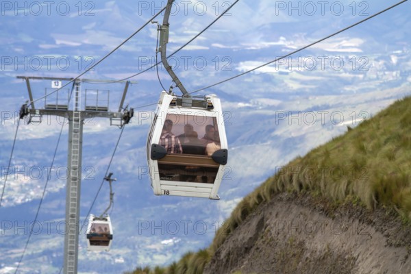 Cable car climbing from Quito to the Cruz loma station. City of Quito, Pichincha province, Ecuador, South America
