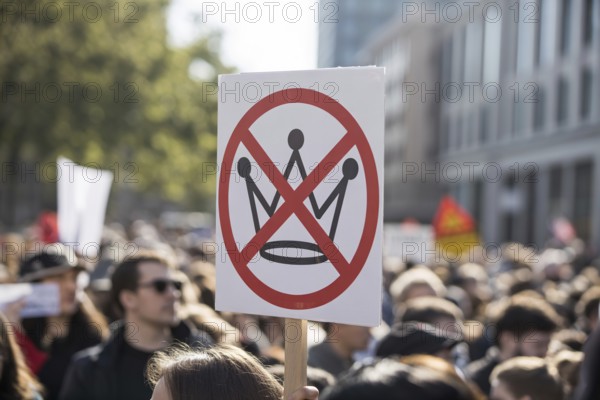 Close-up of protest sign with crossed-out crown. No kings Demonstration in progress. Generative AI, AI generated