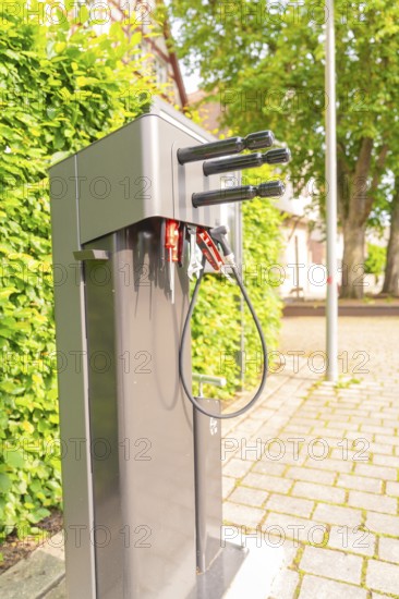 Bicycle repair station on paved ground with trees in the background, Nagold, district of Calw, Germany